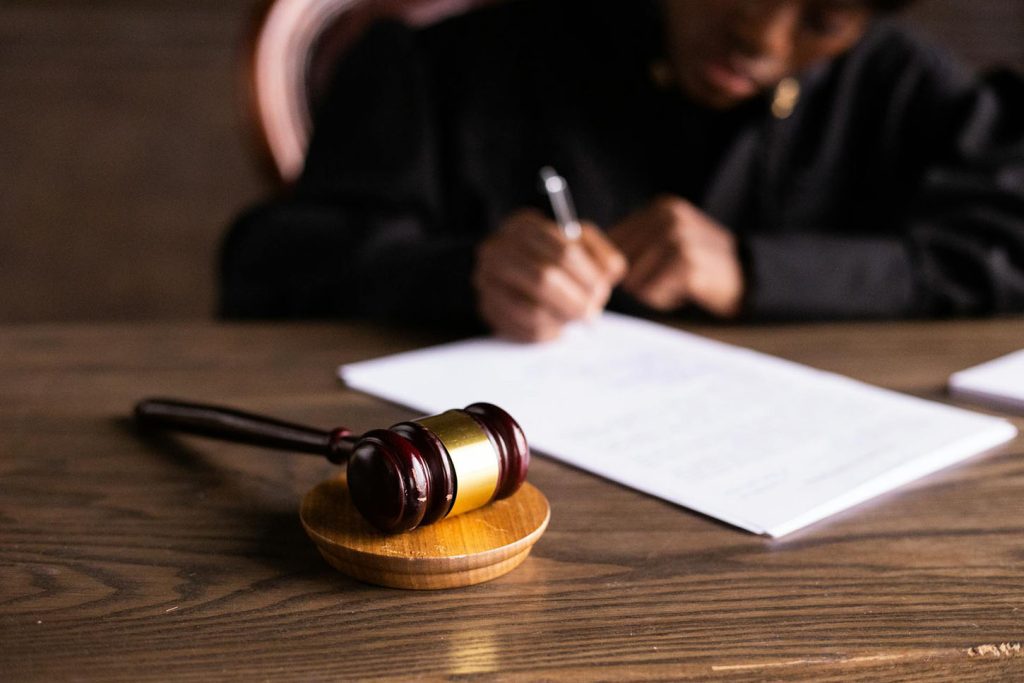 an attorney signing a paper