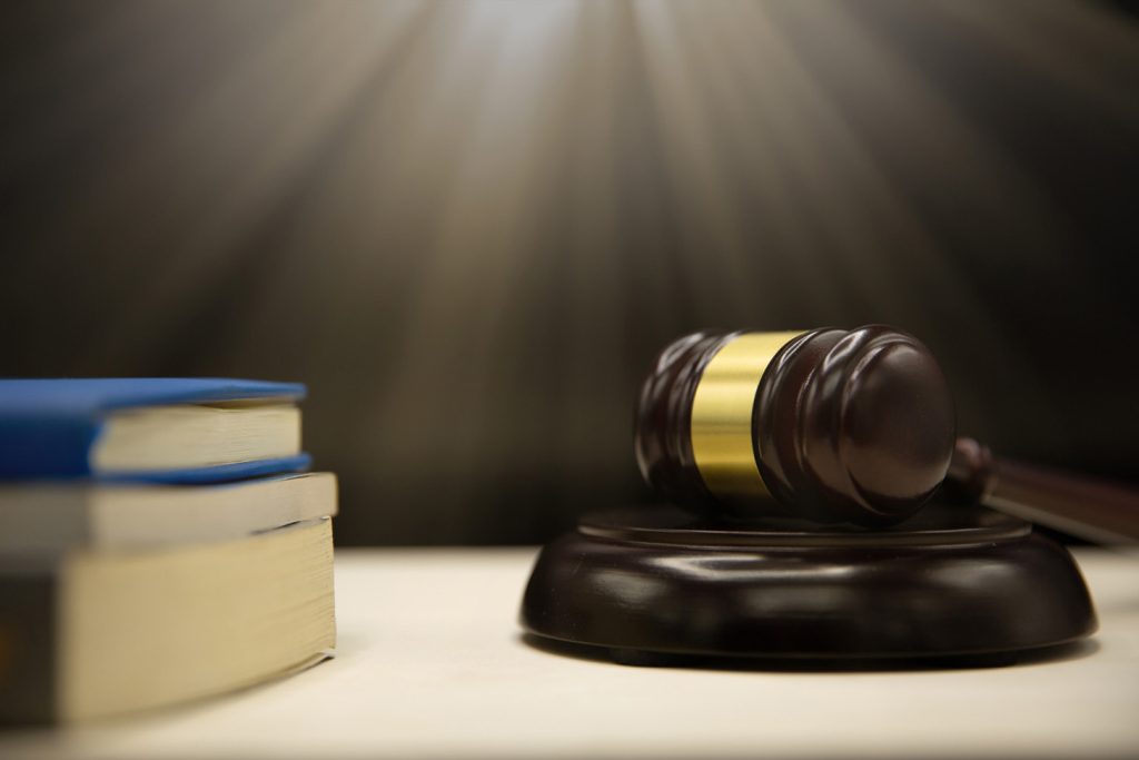 Lakeland defective product lawyer reviewing case evidence