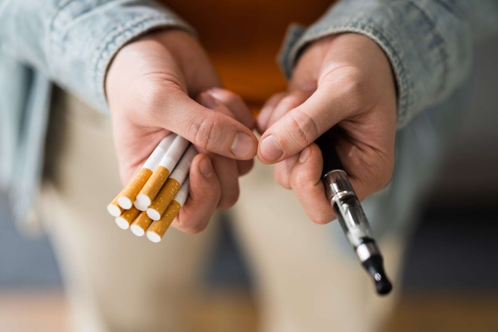 vape pen and cigarettes