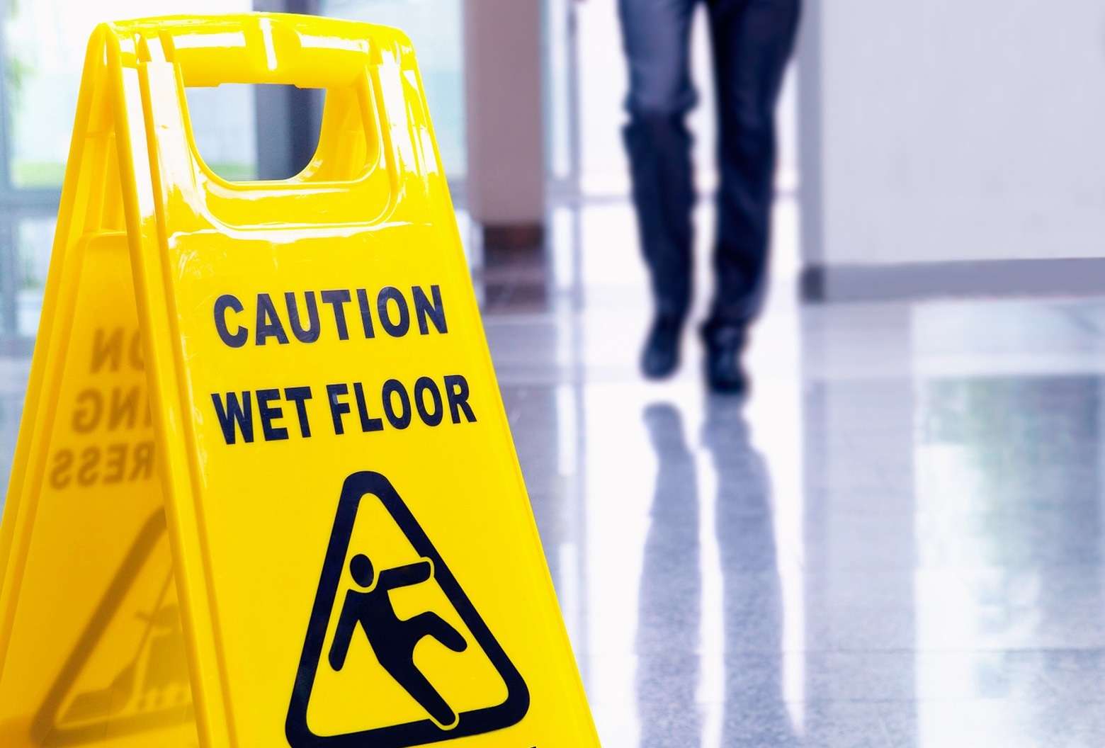 slip and fall warning sign on a floor